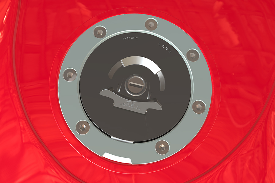 Motorcycle fuel tank cap with variation in reflections (indoor) Motorcycle fuel tank cap with variation in reflections (indoor)